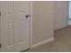 Hallway features closet doors and new gray carpet at 1956 Cutters Mill Way, Lithonia, GA 30058