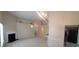 Inviting living room boasts vaulted ceilings, a ceiling fan, and neutral paint at 1956 Cutters Mill Way, Lithonia, GA 30058