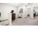 Second floor hallway with view into the bedroom and decorative furnishing at 2515 Norwood Park Xing, Atlanta, GA 30340