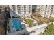 Aerial view of the rooftop pool with a manicured lawn and landscaping at 195 14Th Ne St # 2105, Atlanta, GA 30309