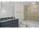 Elegant bathroom with granite countertop, stone shower and soaking tub at 195 14Th Ne St # 2105, Atlanta, GA 30309