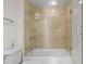 Modern bathroom with large tiled shower and tub combo with glass doors at 195 14Th Ne St # 2105, Atlanta, GA 30309