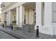 Elegant building entrance with classic architecture, prominent columns, and clear signage at 195 14Th Ne St # 2105, Atlanta, GA 30309