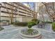 Exterior courtyard featuring a grill, fountain and several seating options at 195 14Th Ne St # 2105, Atlanta, GA 30309