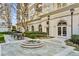 Outdoor courtyard area showcasing lush landscaping and elegant architecture at 195 14Th Ne St # 2105, Atlanta, GA 30309