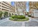 Exterior courtyard area featuring water fountain, grill, and tables for outdoor dining at 195 14Th Ne St # 2105, Atlanta, GA 30309