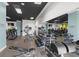 A modern gym featuring treadmills, weight machines, and ample space for fitness activities at 195 14Th Ne St # 2105, Atlanta, GA 30309