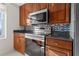 Modern kitchen featuring stainless steel appliances and stylish tile backsplash at 195 14Th Ne St # 2105, Atlanta, GA 30309