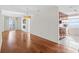 Open-concept living area with hardwood floors, adjacent to a modern kitchen at 195 14Th Ne St # 2105, Atlanta, GA 30309