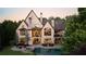 Luxurious backyard with a pool, spa, outdoor seating areas, and beautifully landscaped surroundings at 938 Crescent River Pass, Suwanee, GA 30024