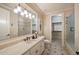 Stylish bathroom with a shower, sleek vanity, and bright lighting at 938 Crescent River Pass, Suwanee, GA 30024