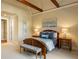 Cozy bedroom featuring soft carpet, neutral walls, and a comfortable-looking bed at 938 Crescent River Pass, Suwanee, GA 30024