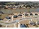 A beautiful aerial view of lakeside homes, featuring well-manicured lawns at 141 Aylesbury Blvd, Mcdonough, GA 30252