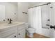 Bathroom with a bathtub and shower combination and white cabinets at 141 Aylesbury Blvd, Mcdonough, GA 30252