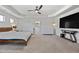 Large main bedroom with white walls, carpet flooring, tray ceiling, fan, and an ensuite bathroom at 141 Aylesbury Blvd, Mcdonough, GA 30252