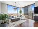 Open-concept living room with floor to ceiling windows showcasing a city view at 270 17Th Nw St # 2002, Atlanta, GA 30363