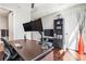 Well-lit office space featuring modern desk setup and a large bookshelf at 270 17Th Nw St # 2002, Atlanta, GA 30363