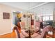 Dining area features hardwood floors and mirrored walls, open to other living spaces at 308 Gettysburg Pl, Atlanta, GA 30350