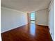 Cozy bedroom with hardwood floors and a large window offering city views at 375 Ralph Mcgill Ne Blvd # 1402, Atlanta, GA 30312