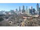 Scenic view of Atlanta skyline with buildings, trees, and other houses in the foreground at 375 Ralph Mcgill Ne Blvd # 1402, Atlanta, GA 30312