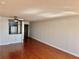 Bright living area with hardwood floors and an open layout, leading into the kitchen space at 375 Ralph Mcgill Ne Blvd # 1402, Atlanta, GA 30312