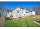 The backyard features a deck, a fenced yard, and green grass at 2357 Lynn Iris Dr, Decatur, GA 30032