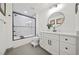 This bathroom features a shower over tub with sliding glass doors at 2357 Lynn Iris Dr, Decatur, GA 30032