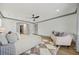 Spacious main bedroom with ceiling fan, sitting area and walk-in closet at 2357 Lynn Iris Dr, Decatur, GA 30032