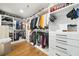 Organized walk-in closet with custom shelving, drawers, and ample hanging space for clothes and shoes at 2357 Lynn Iris Dr, Decatur, GA 30032