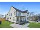 Charming two-story home featuring a covered porch with unique hanging chairs for relaxed outdoor living at 2357 Lynn Iris Dr, Decatur, GA 30032
