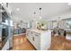 Modern kitchen island with a view of a living area, showcasing the open-concept layout at 2357 Lynn Iris Dr, Decatur, GA 30032