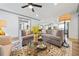 Inviting living room with a large sofa, stylish decor, and hardwood floors, great for relaxing at 2357 Lynn Iris Dr, Decatur, GA 30032
