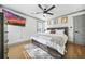 Cozy main bedroom with a comfortable bed, a ceiling fan, and warm natural light at 2357 Lynn Iris Dr, Decatur, GA 30032