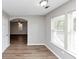 Dining area features wood-look flooring, neutral paint and lots of light from windows at 346 Henry Aaron Sw Ave, Atlanta, GA 30310