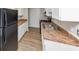 Well-appointed kitchen with ample counter space, white cabinets, and modern appliances at 346 Henry Aaron Sw Ave, Atlanta, GA 30310