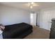 Neutral bedroom with carpet, a ceiling fan, and ample closet space at 642 Towering Pine Trl, Lawrenceville, GA 30043