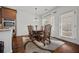Charming dining room with natural light and access to the backyard at 644 Crystal Cove Ct, Loganville, GA 30052