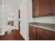 Hallway with granite counters that leads to the living room at 644 Crystal Cove Ct, Loganville, GA 30052