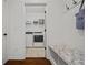 Well-organized laundry room with bench and storage at 644 Crystal Cove Ct, Loganville, GA 30052