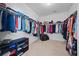 Spacious walk-in closet with ample storage and shelving for organization at 644 Crystal Cove Ct, Loganville, GA 30052