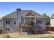 Charming home featuring a deck, well-maintained backyard, and a serene outdoor living space at 1772 Ascot Nw Run, Acworth, GA 30102