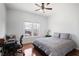 Bedroom with wood floors, double window and desk at 1772 Ascot Nw Run, Acworth, GA 30102