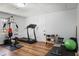 Finished basement gym with multiple workout machines and equipment at 1772 Ascot Nw Run, Acworth, GA 30102