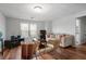 Finished basement living room with hardwood floors and a comfortable seating area at 1772 Ascot Nw Run, Acworth, GA 30102