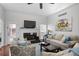 Spacious living room with vaulted ceiling, fireplace, and hardwood floors is perfect for entertaining and relaxation at 1772 Ascot Nw Run, Acworth, GA 30102