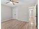 Bedroom showcasing new laminate flooring and a closet at 649 Woodcrest Manor Dr, Stone Mountain, GA 30083