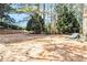 Large backyard offers privacy and shade with mature trees surrounding at 11 Tallulah Ct, Jonesboro, GA 30236