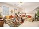 Spacious living room area with bright, airy feel and comfortable furnishings, perfect for relaxation at 11 Tallulah Ct, Jonesboro, GA 30236