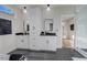Modern bathroom featuring double vanity sinks and walk-in shower with glass door at 2014 Cambridge Ave, Atlanta, GA 30337