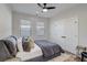 Cozy bedroom with a comfortable bed, neutral decor, and ample natural light at 2014 Cambridge Ave, Atlanta, GA 30337